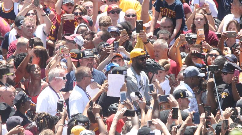 LeBron James rides in the parade at the Cleveland Cavaliers celebration on Wednesday, June 22, 2016, in Cleveland. David Jablonski/Staff