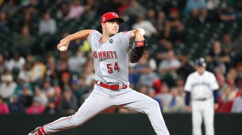 SEATTLE, WASHINGTON - SEPTEMBER 11: Sonny Gray #54 of the Cincinnati Reds pitches against the Seattle Mariners in the sixth inning during their game at T-Mobile Park on September 11, 2019 in Seattle, Washington. (Photo by Abbie Parr/Getty Images)