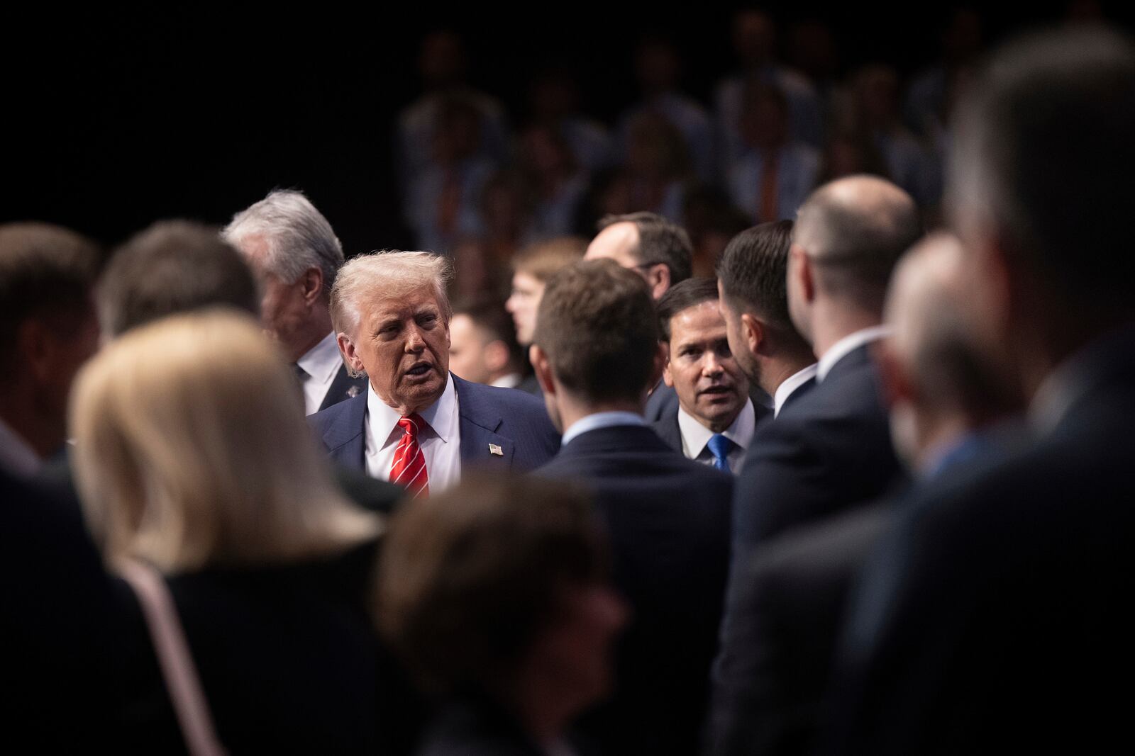 U.S. President Donald Trump, left, and U.S. Secretary of State Marco Rubio arrive before the start of a plenary session of the NATO summit of heads of state and government in The Hague, Netherlands, Wednesday, June 25, 2025. (Brendan Smialowski/Pool Photo via AP)