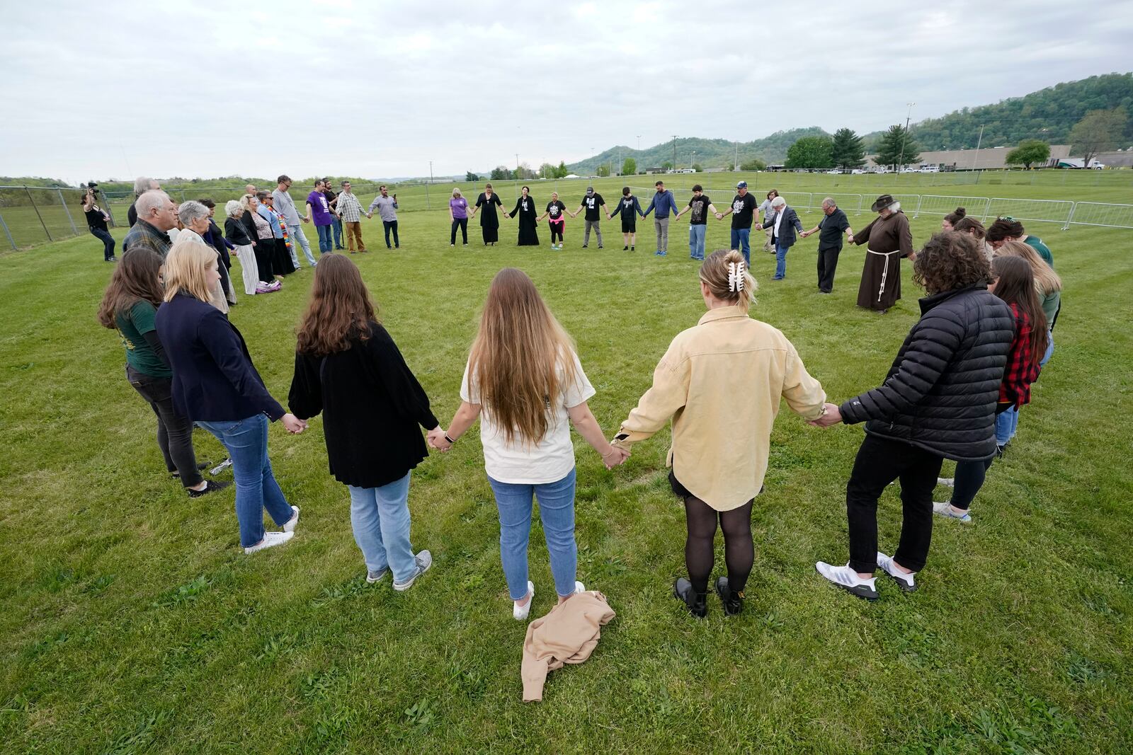 FILE - Capital punishment protesters pray on the grounds of Riverbend Maximum Security Institution before the scheduled execution of inmate Oscar Smith, Thursday, April 21, 2022, in Nashville, Tenn. (AP Photo/Mark Humphrey, File)