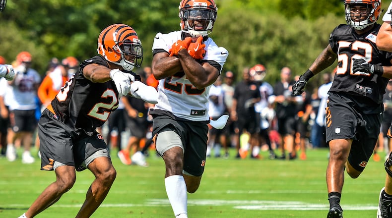 Running back Giovani Bernard carries the ball during the first day of Cincinnati Bengals Training Camp Friday, July 28, 2017, at the practice fields beside Paul Brown Stadium in Cincinnati. NICK GRAHAM/STAFF