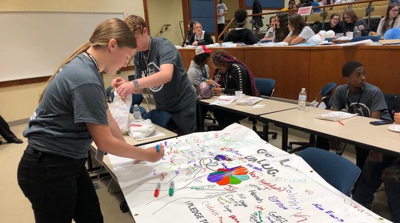 Local students shared examples of the projects they did to improve their communities and family relations on Thursday during the Be the Change Youth Summit at Wittenberg University.