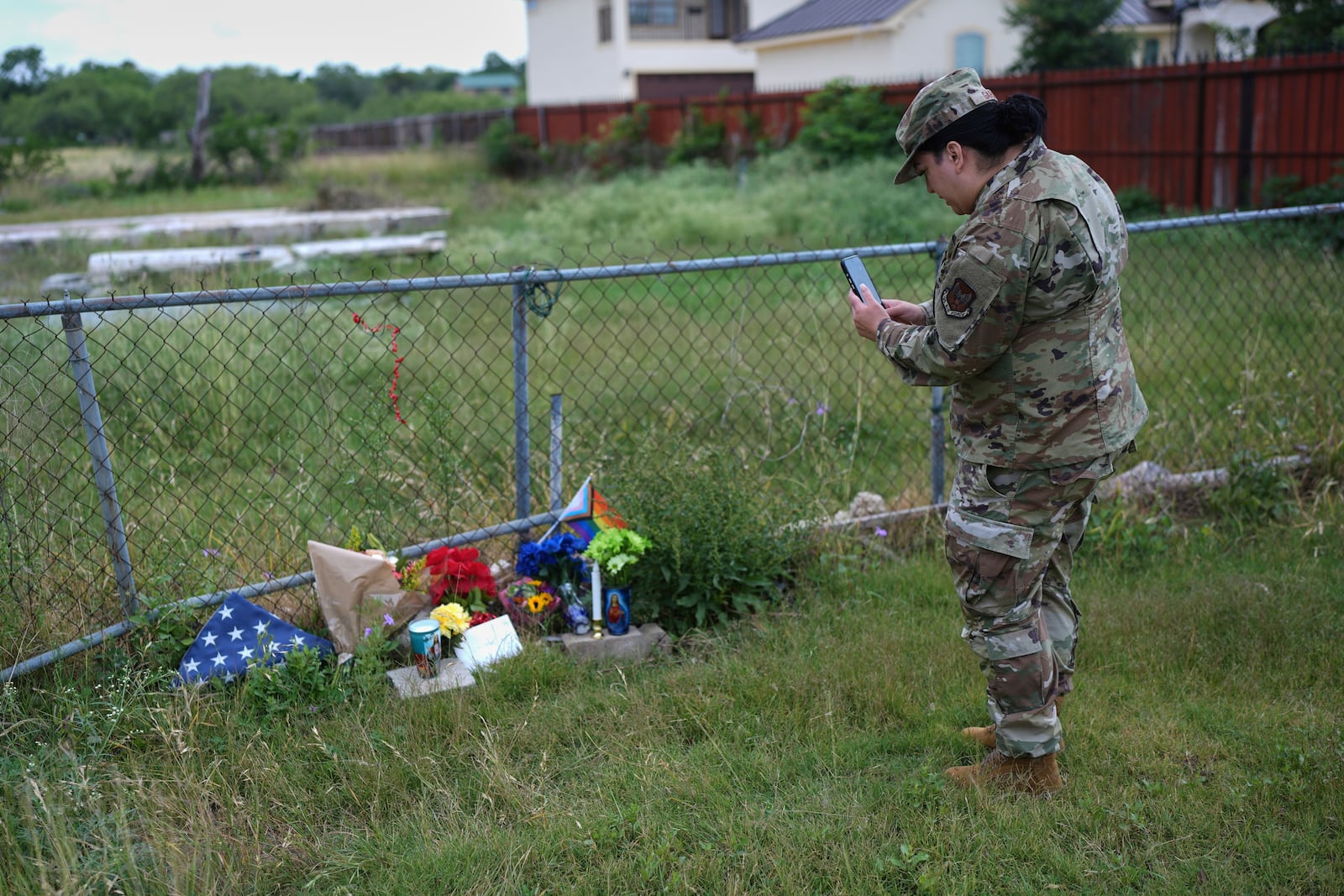 Candles, flowers, and notes make up make-shift memorial for voice actor Jonathan Joss who was recently killed, Tuesday, June 3, 2025, in San Antonio. (AP Photo/Eric Gay)