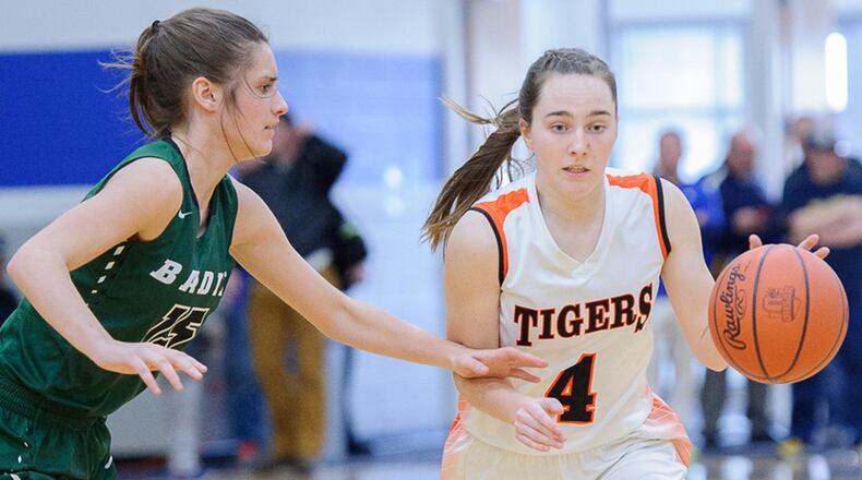 Badin’s Grace Larkin covers West Liberty-Salem’s Gabby Hollar during Division III district play Saturday at Springfield. CONTRIBUTED PHOTO BY BRYANT BILLING