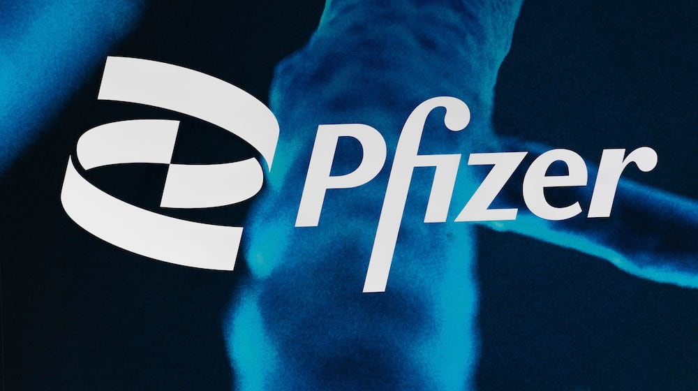 FILE - The Pfizer logo is displayed at the company's headquarters, Friday, Feb. 5, 2021, in New York. (AP Photo/Mark Lennihan, File)