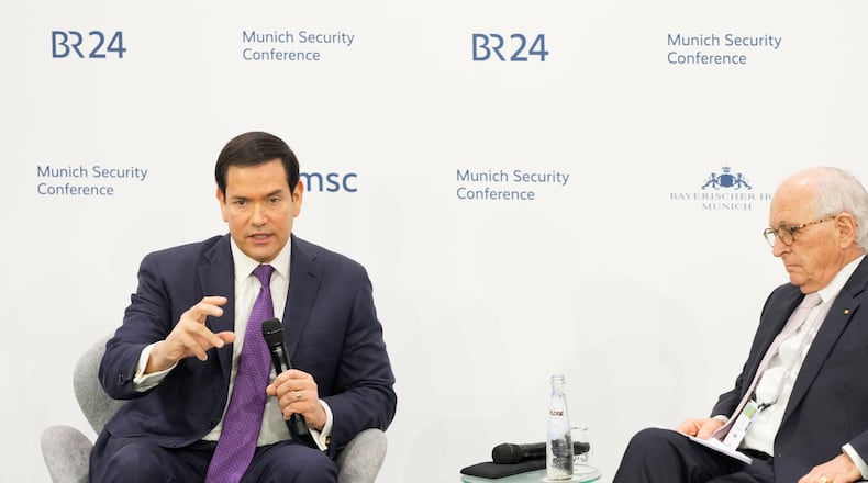 U.S. Secretary of State Marco Rubio speaks, next to the Chairman of the Munich Security Conference Wolfgang Ischinger, at the Munich Security Conference in Munich, Germany, Saturday, Feb. 14, 2026. (AP Photo/Alex Brandon, Pool)