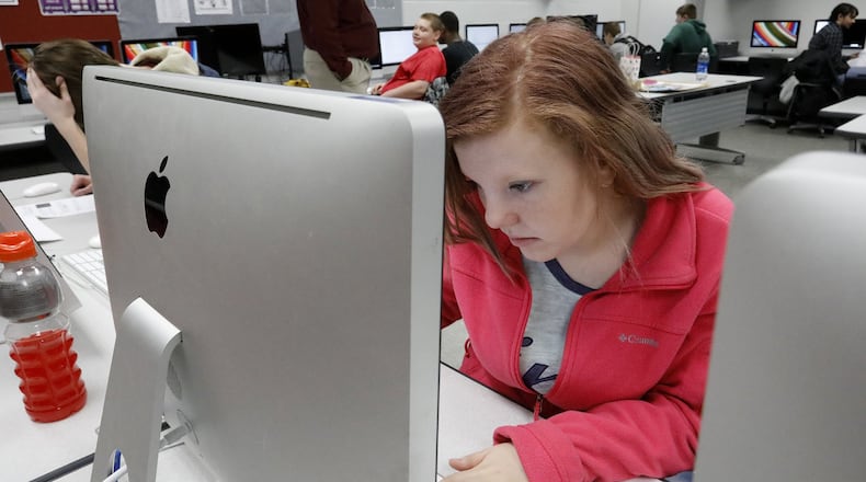 Braelin Temple, a freshman at Springfield High School, works in her computer science class. Bill Lackey/Staff