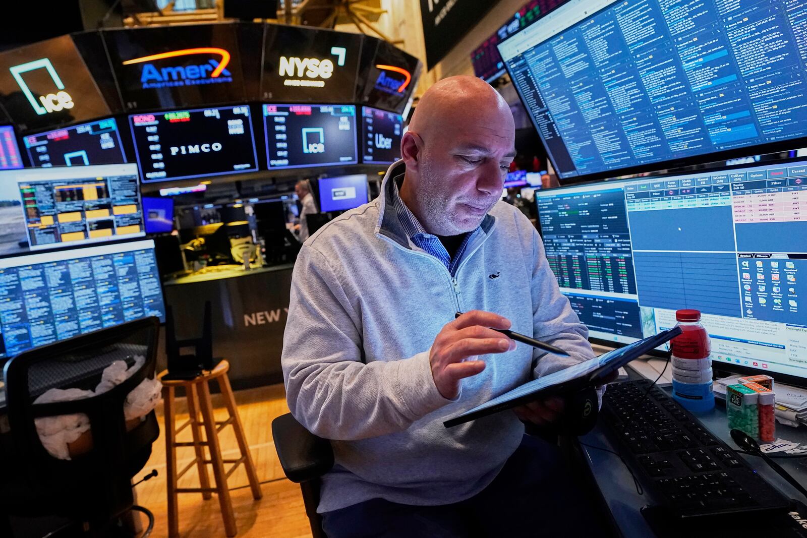 Vincent Napolitano works on the floor of the New York Stock Exchange, Friday, April 11, 2025. (AP Photo/Richard Drew)