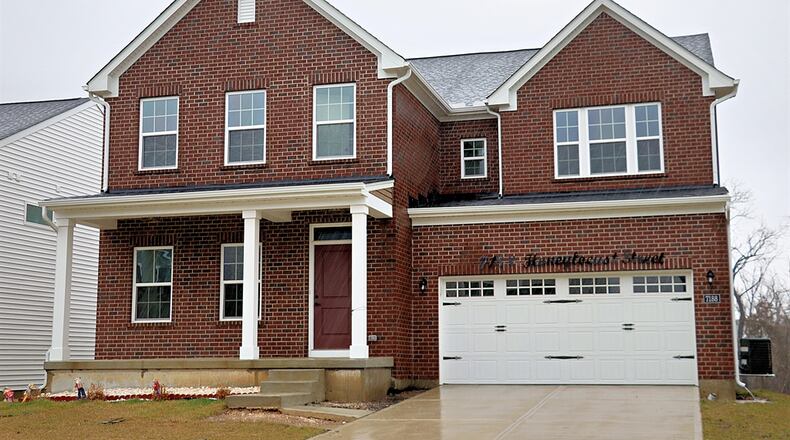 Listed for $530,000 by Cutler Real Estate, the brick-and-vinyl home at 7188 Honeylocust St. has about 4,446 square feet of living space. Contributed photos by Kathy Tyler