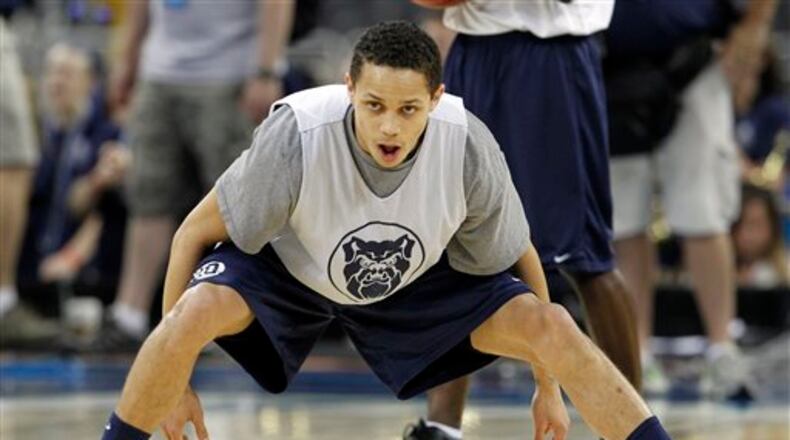 Butler's Chrishawn Hopkins stretches during a practice for a men's NCAA Final Four semifinal college basketball game Friday, April 1, 2011, in Houston. Butler plays Virginia Commonwealth on Saturday. (AP Photo/Mark Humphrey)