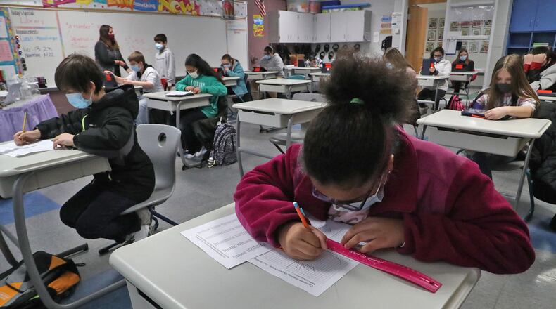 K-12 state tests for Clark, Champaign schools ongoing through COVID pandemic. Here, students at Simon Kenton Elementary work on classwork. BILL LACKEY/STAFF