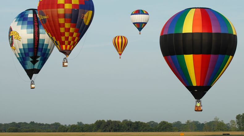Eleven hot air balloons landed at Grimes Field in Urbana after a morning flight on Saturday, July 7, 2012, during the sixth annual Balloon Fest which is coordinated by the Champaign County Visitors Bureau.
Staff photo by Barbara J. Perenic