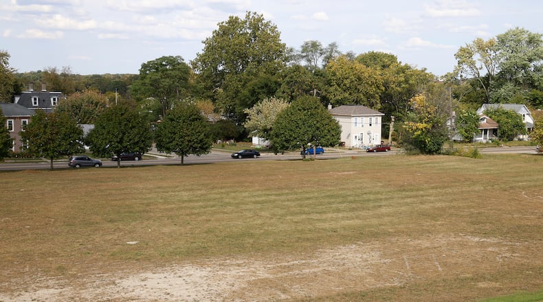 The vacant field at 1315 W. High St. is the site of a proposed apartment complex. BILL LACKEY/STAFF