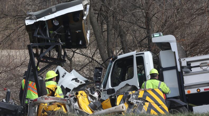 An Ohio Department of Transportation vehicle was struck by a box truck on I-70 westbound Monday, March 28, 2022. Both the driver of the box truck and the ODOT worker were transported to hospital with non life threatening injuries. BILL LACKEY/STAFF
