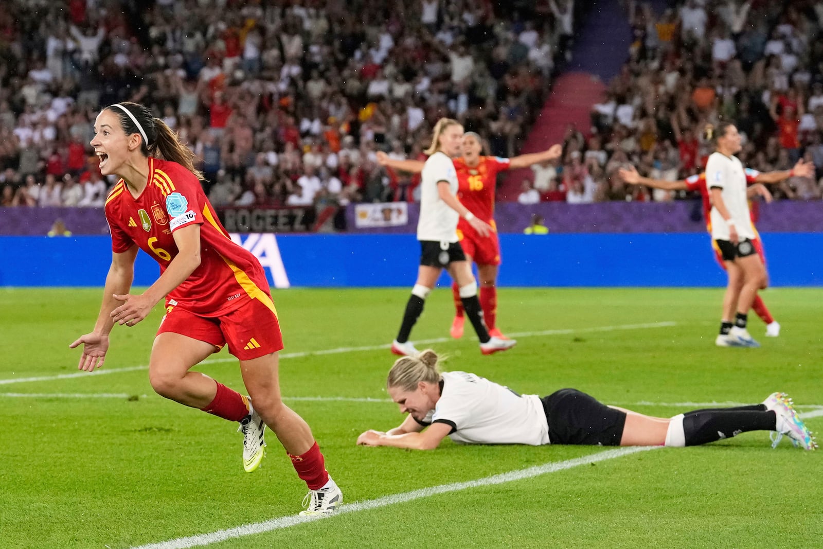 Spain's Aitana Bonmati celebrates after scoring the opening goal during the Women's Euro 2025 semifinals soccer match between Germany and Spain at Stadion Letzigrund in Zurich, Switzerland, Wednesday, July 23, 2025. (AP Photo/Alessandra Tarantino)