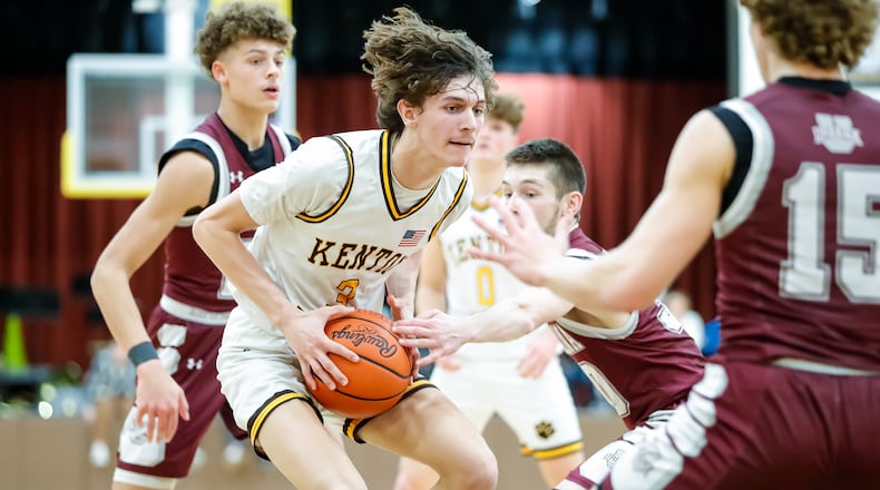 Kenton Ridge High School senior Ckai Rogan drives through the lane during their game against Urbana on Friday night in Springfield. The Cougars won 67-53. Michael Cooper/CONTRIBUTED