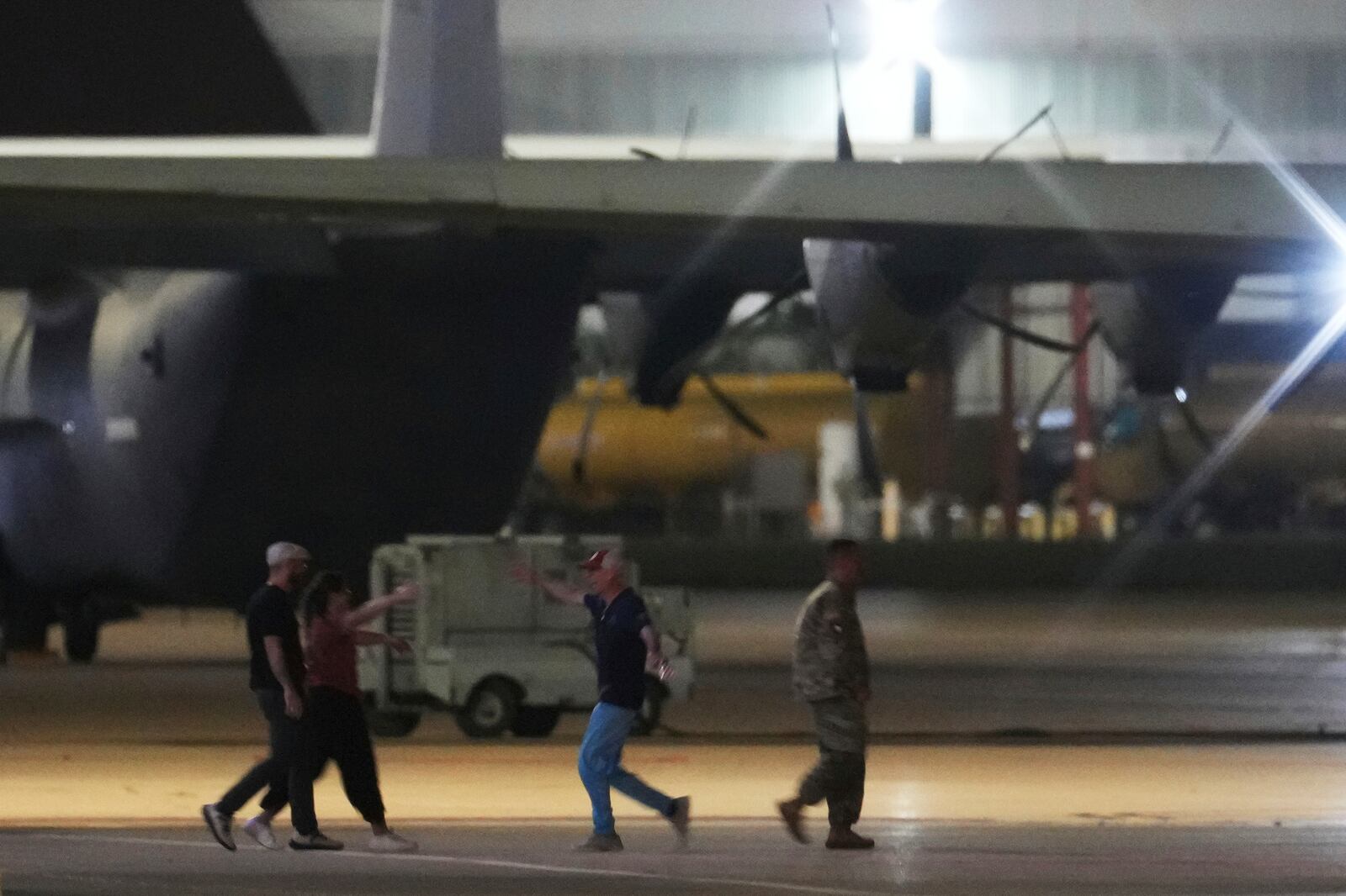 Jailed Americans that were released by Venezuela arrive in San Antonio, Friday, July 18, 2025. (AP Photo/Eric Gay)