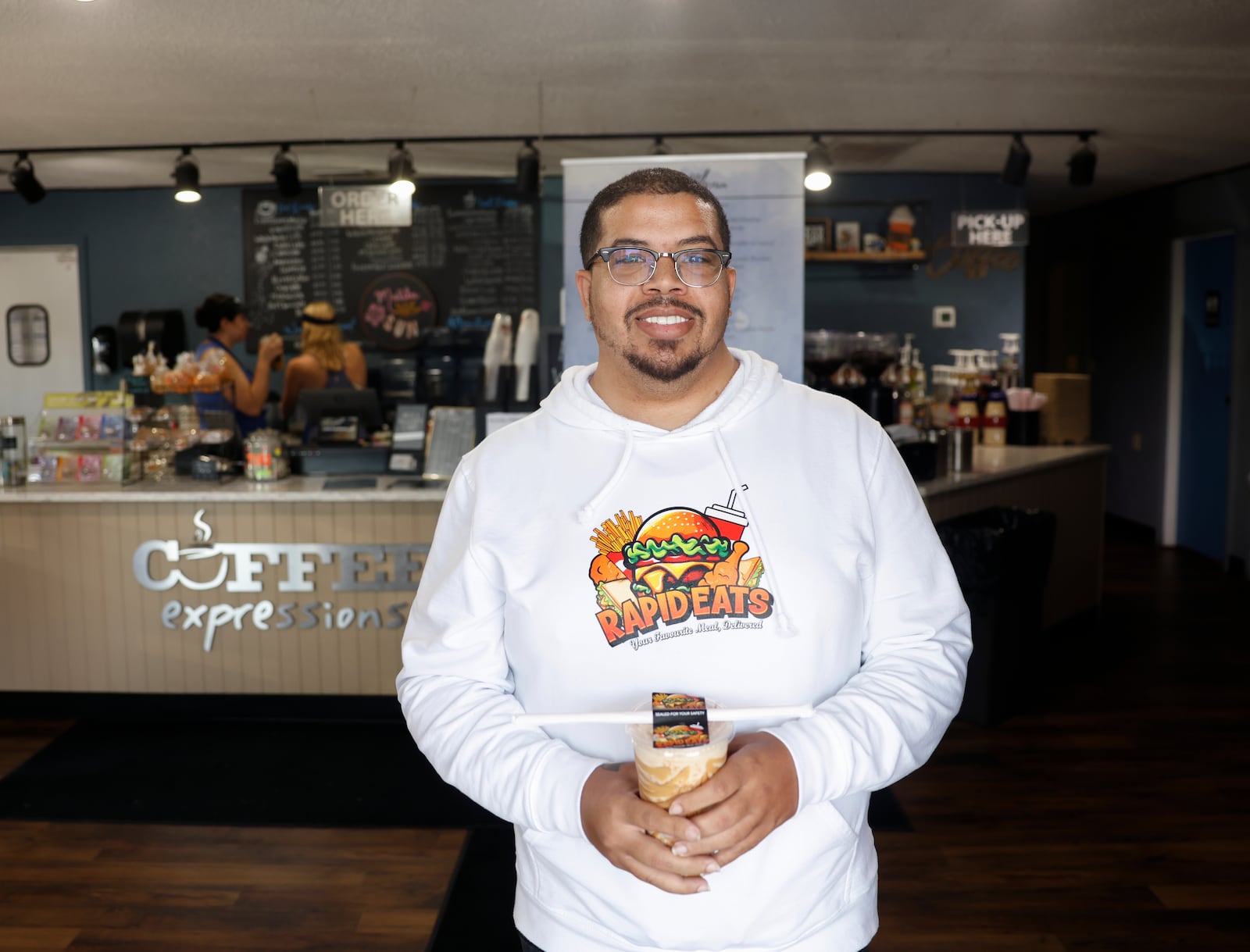 Rapid Eats CEO/founder Jordan Powell poses for a portrait after getting cup of coffee referred to as "Liv's drink" on Thursday, June 26, 2025, at Coffee Expression. JOSEPH COOKE/STAFFJordan Powell 