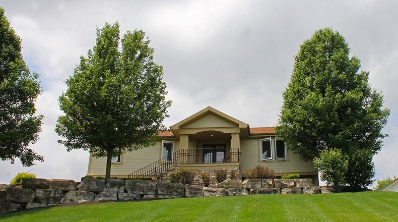 This 4-bedroom elevated ranch home with about 2,880 sq. ft. of living space sits on a picturesque hilltop. It includes a walkout lower level, pool and outbuilding. CONTRIBUTED PHOTOS BY VICKIE KAPNAS