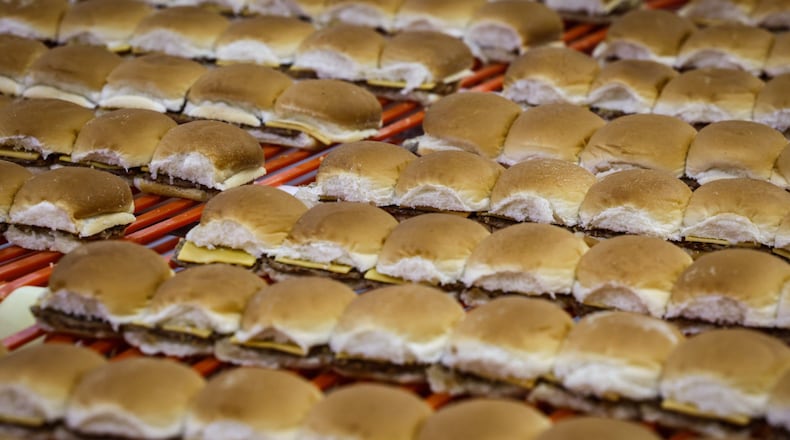 Over a million White Castle hamburgers are made each day at the Vandalia plant. JIM NOELKER/STAFF