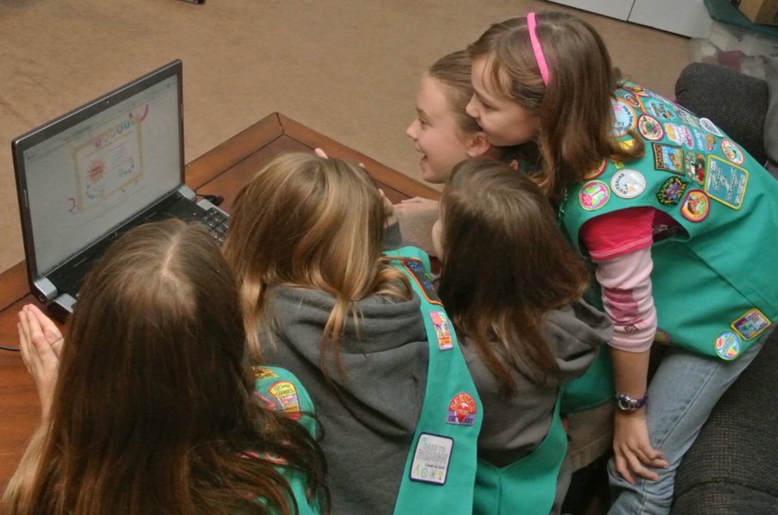 Girl Scout troop 48070 in Monroe is shown setting goals for the cookie sale season, which started Jan. 9. Local troops can use a private Girl Scout website to sell cookies via email to known customers, while deliveries and payment are done in person. CONTRIBUTED