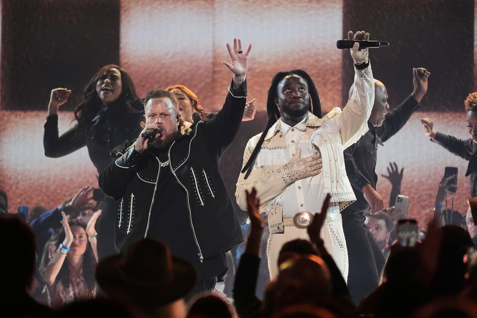 Jelly Roll, left, and Shaboozey perform "Amen" during the 60th annual Academy of Country Music Awards on Thursday, May 8, 2025, in Frisco, Texas. (AP Photo/Chris Pizzello)