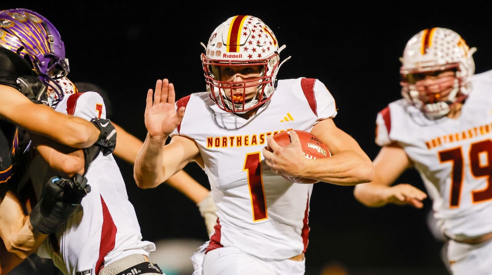 Northeastern High School senior Cody Houseman runs the ball during their game against Mechanicsburg on Friday, Oct. 17 at Indian Stadium. The Jets won 52-26. MICHAEL COOPER / STAFF