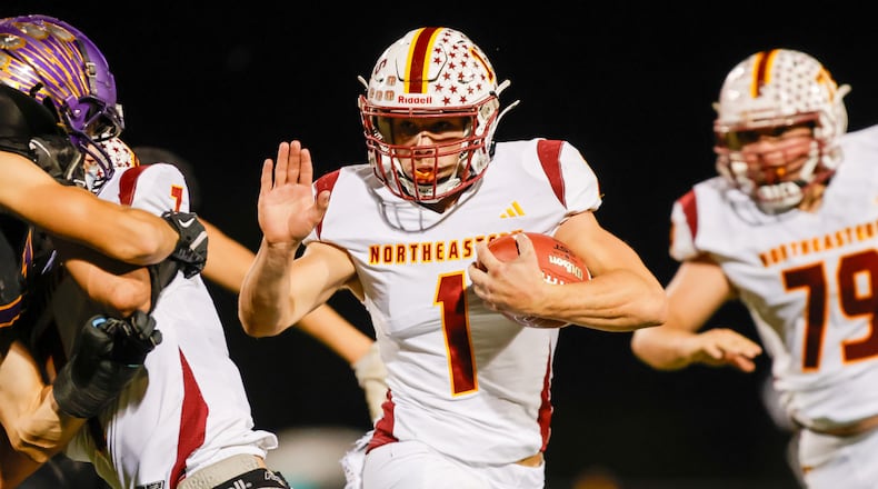 Northeastern High School senior Cody Houseman runs the ball during their game against Mechanicsburg on Friday, Oct. 17 at Indian Stadium. The Jets won 52-26. MICHAEL COOPER / STAFF