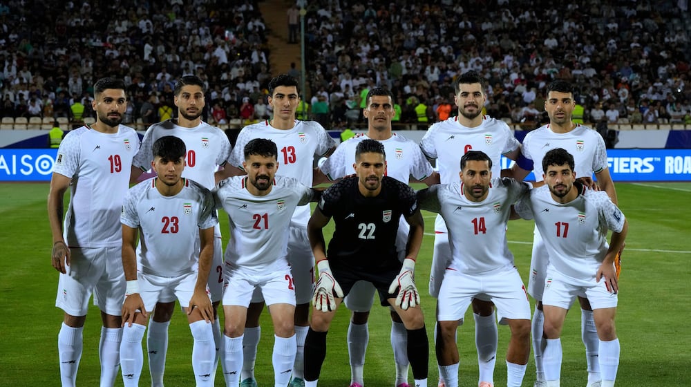 FILE - Irans's players pose for a team photo before an Asian group A qualifying soccer match against North Korea for the 2026 World Cup, June 10, 2025, at Azadi Stadium in Tehran, Iran. (AP Photo/Vahid Salemi, file)