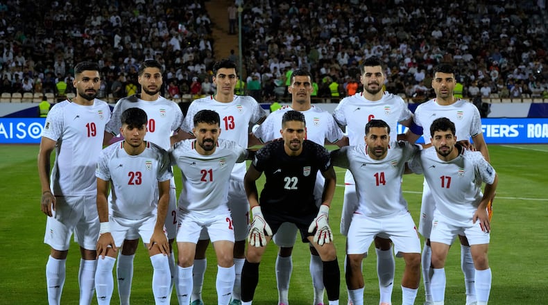 FILE - Irans's players pose for a team photo before an Asian group A qualifying soccer match against North Korea for the 2026 World Cup, June 10, 2025, at Azadi Stadium in Tehran, Iran. (AP Photo/Vahid Salemi, file)
