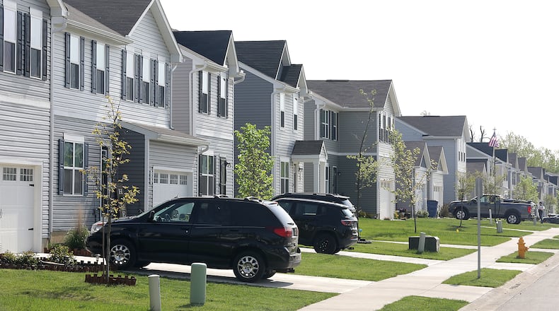 Dozens of new houses in a row. All part of the Bridgewater development. BILL LACKEY/STAFF