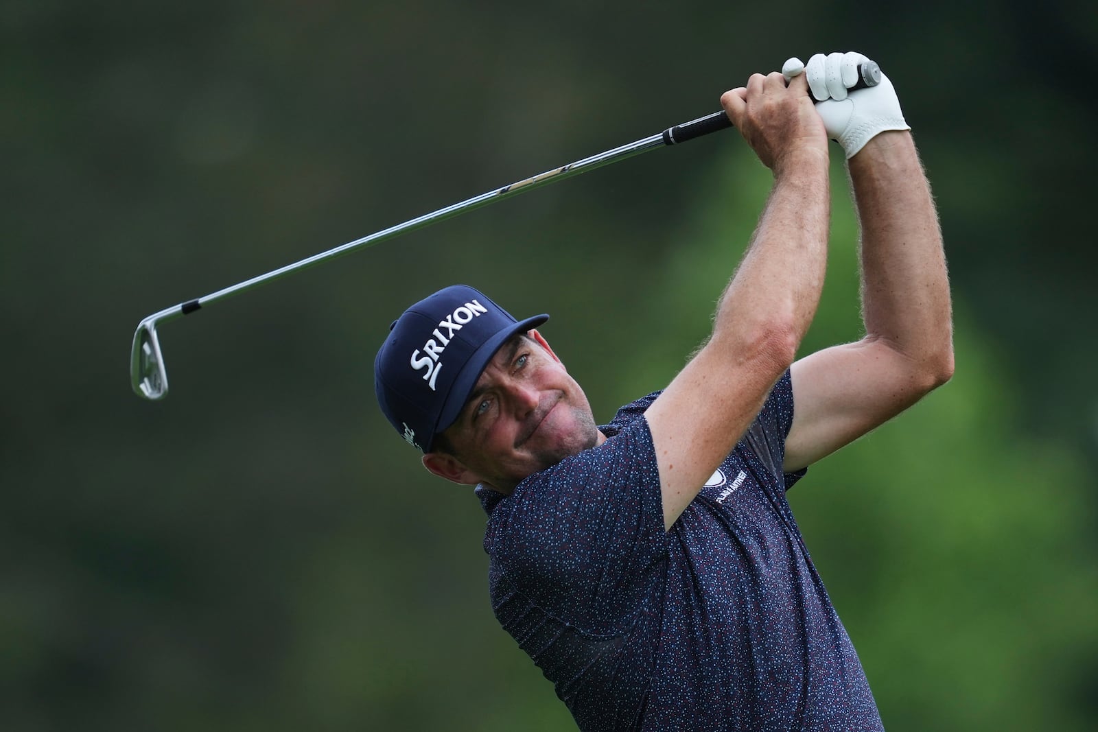 Keegan Bradley hits from the ninth tee during the first round of the Rocket Classic golf tournament at the Detroit Golf Club, Thursday, June 26, 2025, in Detroit. (AP Photo/Paul Sancya)