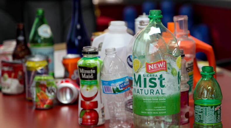 The Rumpke Recycling facility in Cincinnati receives 250-300 tons of recyclable material each day from several counties including Butler and Warren. Some of the items they accept are shown here. Staff photo by Greg Lynch