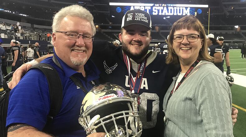 Alex Temple with his parents Steve and Pam. CONTRIBUTED
