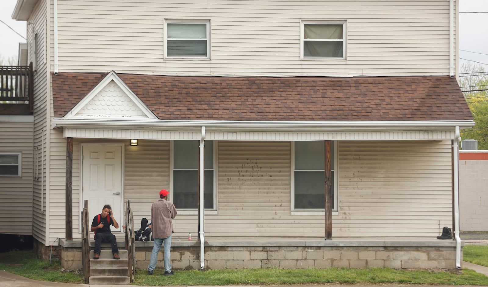 A small group congregates on the morning of Friday, May 2, 2025, at the Hartley House. JOSEPH COOKE/STAFF