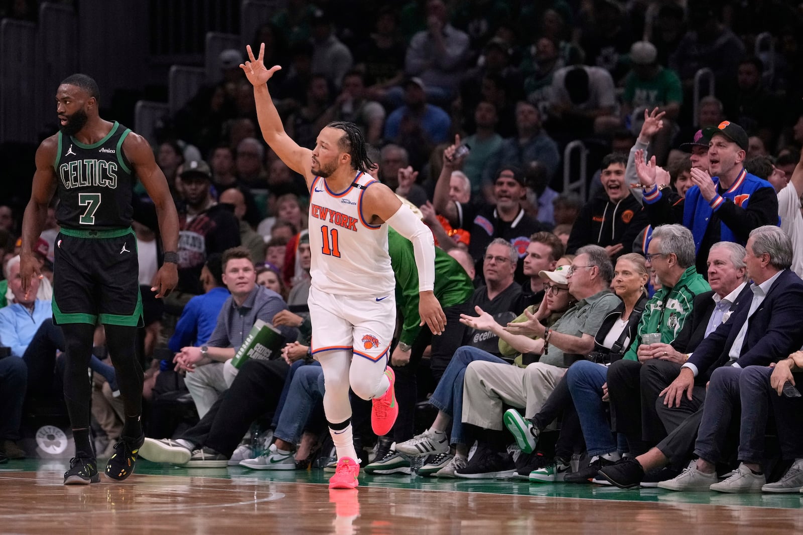 New York Knicks guard Jalen Brunson (11) celebrates after hitting a 3-pointer during the first half of Game 5 of an NBA basketball second-round playoff series against the Boston Celtics, Wednesday, May 14, 2025, in Boston. (AP Photo/Charles Krupa)