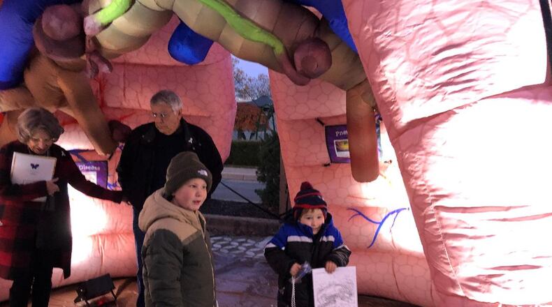 Several events will be held this week in Clark and Champaign Counties, including Mercy Health – Springfield's "Shine a Light on Lung Cancer” event on Thursday. In this file photos, cousins Reid Crable and Karlson Westfall explored the inflatable lung display showing the dangers the lungs face from smoking and vaping as part of this event. File/Photo by Brett Turner