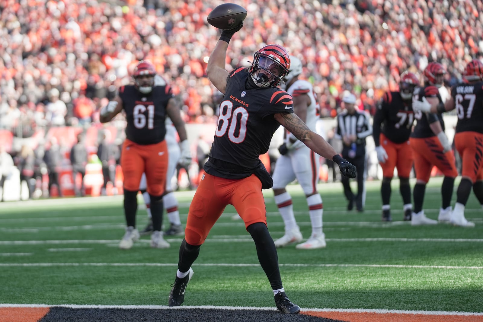 Cincinnati Bengals wide receiver Andrei Iosivas (80) reacts after scoring a touchdown during the first half of an NFL football game against the Cleveland Browns, Sunday, Dec. 22, 2024, in Cincinnati. (AP Photo/Joshua A. Bickel)