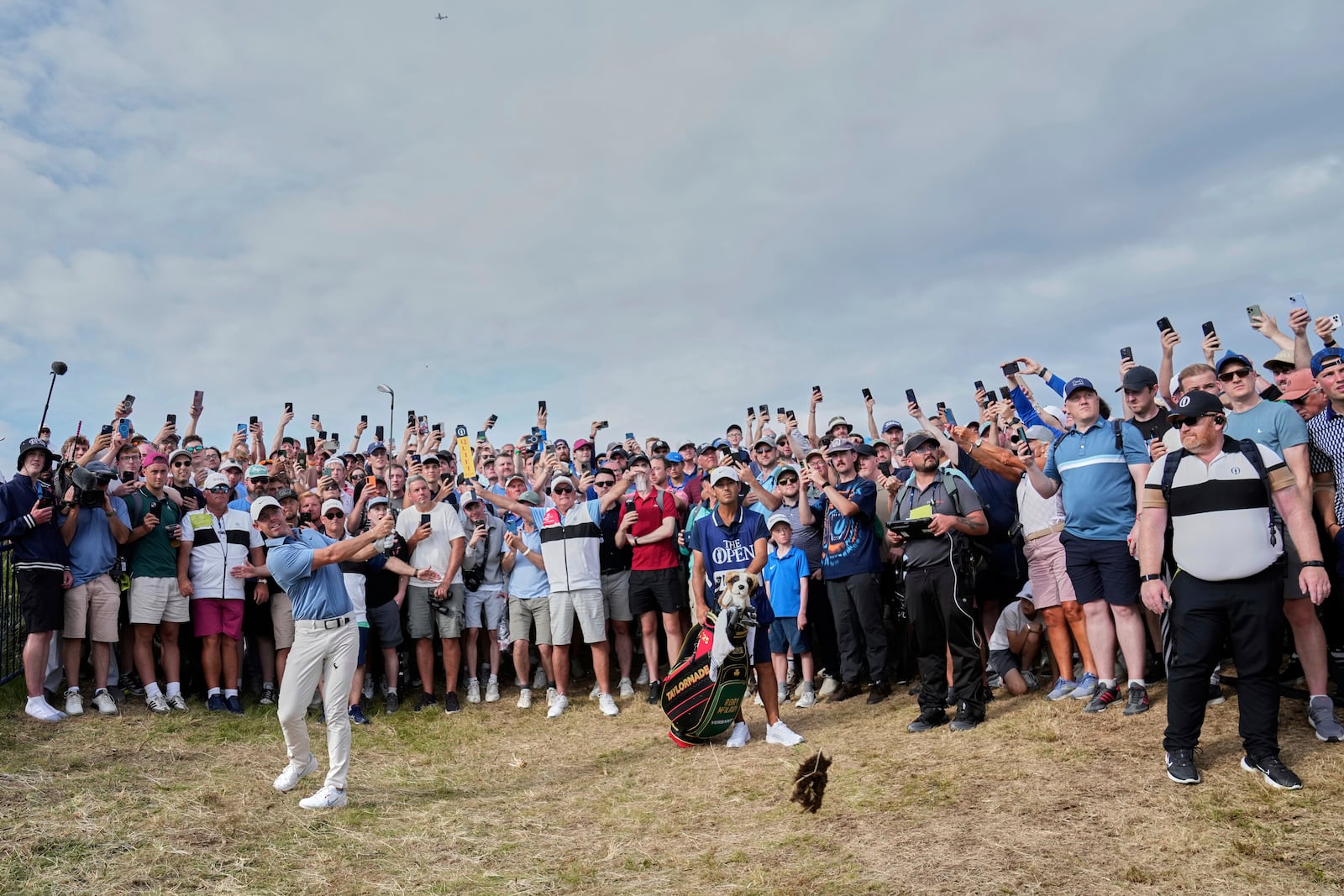 Rory McIlroy of Northern Ireland plays out of the rough on the 17th hole during the final round of the British Open golf championship at the Royal Portrush Golf Club, Northern Ireland, Sunday, July 20, 2025. (AP Photo/Jon Super)