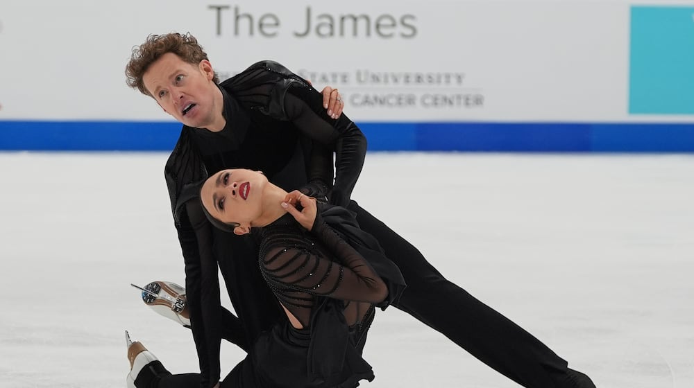 Madison Chock and Evan Bates skate during the free dance competition at the U.S. Figure Skating Championships, Saturday, Jan. 10, 2026, in St. Louis. (AP Photo/Stephanie Scarbrough)