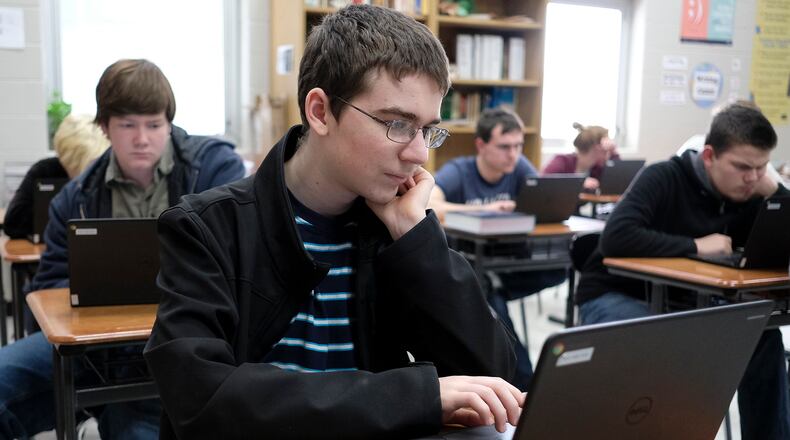 Tyler Wooten, a student at Graham High School studies for an exam in his English class. Bill Lackey/Staff