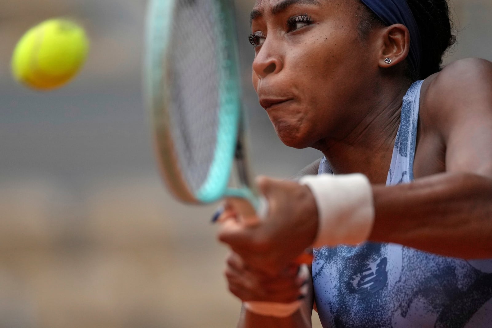 Coco Gauff of the U.S. returns the ball to Australia's Olivia Gadecki during their first round match of the French Tennis Open, at the Roland-Garros stadium, in Paris, Tuesday, May 27, 2025. (AP Photo/Thibault Camus)