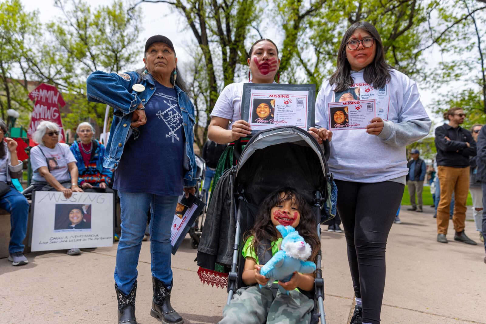 Relatives of Darian Nevayaktewa, a member of the Pueblo of Tesque who went missing on the Hopi Indian Reservation in 2008, raise awareness about his disappearance at a rally in Santa Fe, N.M., Sunday, May 4, 2025. (Nilaya Sabnis via AP)
