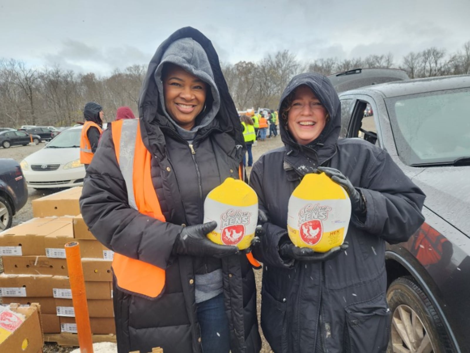 The Foodbank volunteers handing out Cornish hens to families at its Thanksgiving Mass Food Distribution. THE FOODBANK/CONTRIBUTED