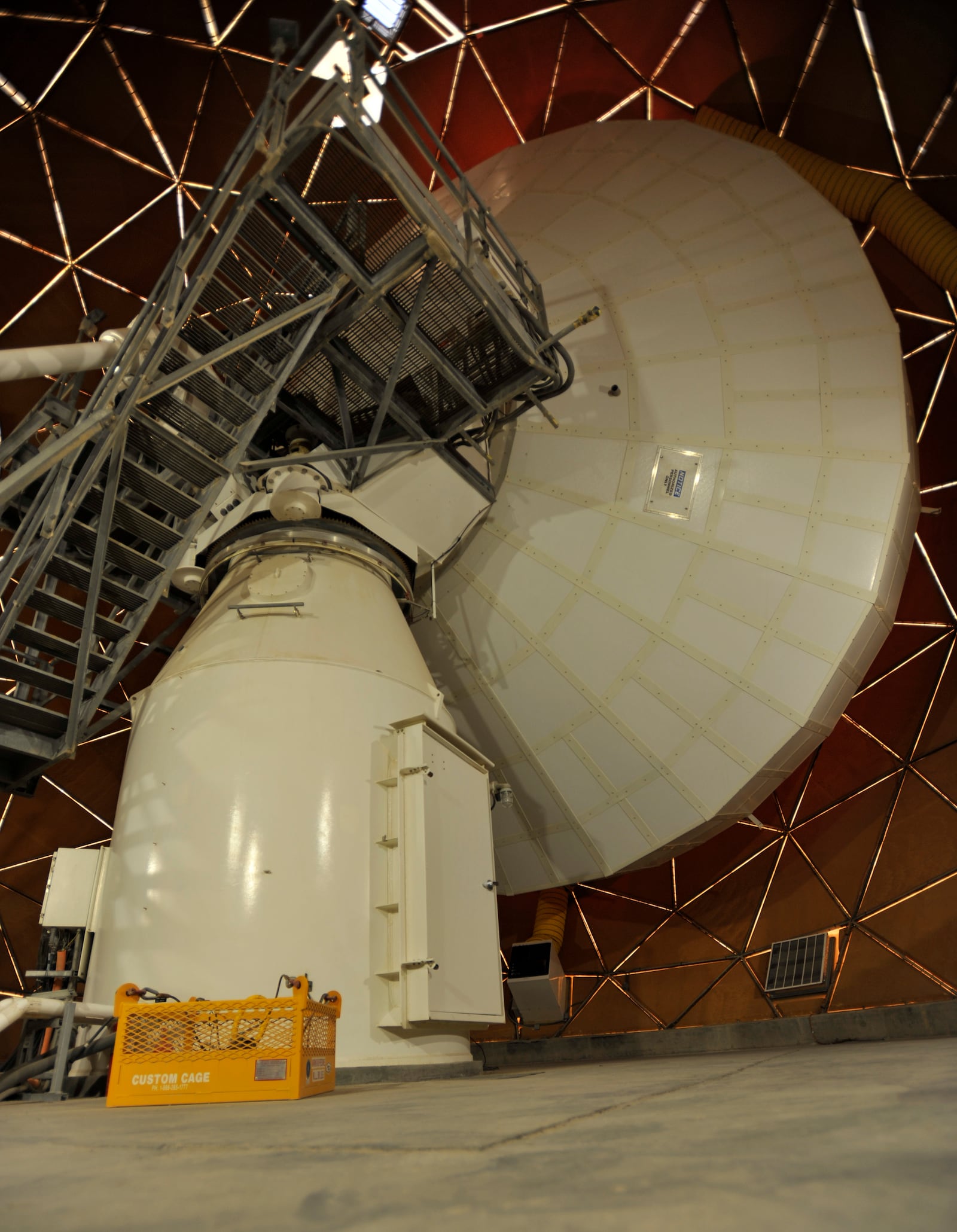 This handout photo from the U.S. Air Force shows the Modernized Enterprise Terminal sits inside a radome at Al Udeid Air Base, Qatar, Jan. 21, 2016. (Master Sgt. Joshua Strang/U.S. Air Force via AP)