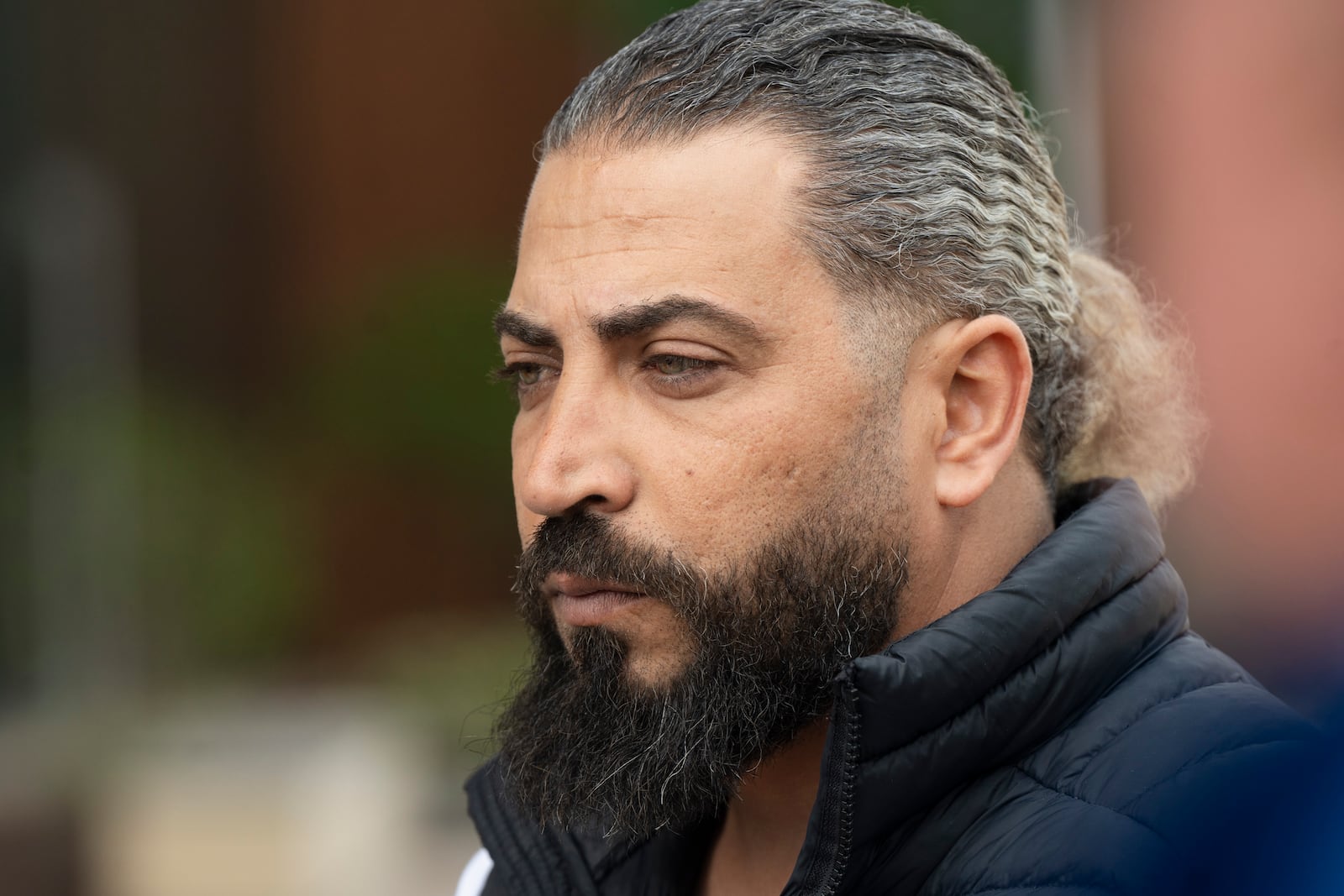 Odai Al Fayoumi, father of Wadee Al Fayoumi, who was murdered by Joseph Czuba in 2023, speaks to the media after the sentencing of Czuba outside the Will County Courthouse in Joliet, Ill., Friday, May 2, 2025. (Pat Nabong /Chicago Sun-Times via AP)