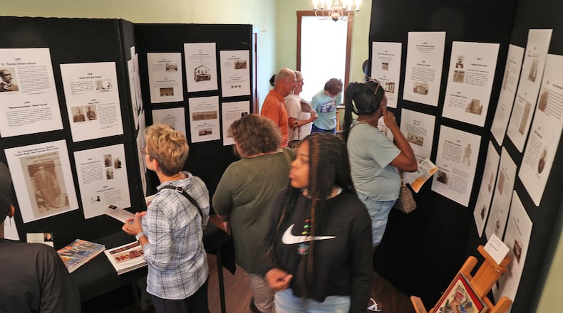 People tour the historic Gammon House in Springfield as part of a Juneteenth Celebration last year. The Gammon House is one of nine arts, tourism and cultural organizations that will be receiving grants from the city using American Rescue Plan dollars. BILL LACKEY/STAFF
