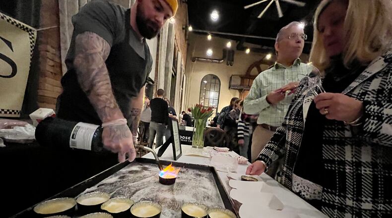 Creme Brulee from Coco's Bistro getting fired at Sneak Peek to Winter Restaurant Week 2023. FILE