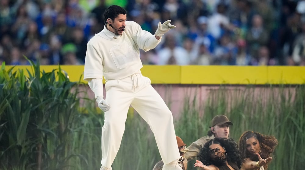 Bad Bunny performs during halftime of the NFL Super Bowl 60 football game between the New England Patriots and the Seattle Seahawks, Sunday, Feb. 8, 2026, in Santa Clara, Calif. (AP Photo/Julio Cortez)