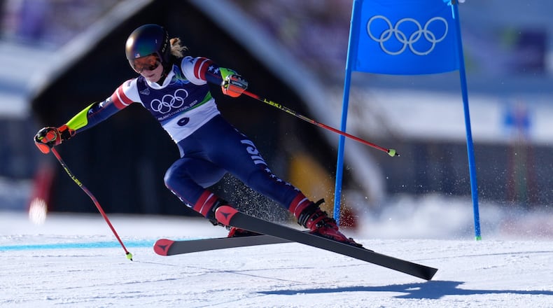United States' Mikaela Shiffrin speeds down the course, during an alpine ski, women's giant slalom race, at the 2026 Winter Olympics, in Cortina d'Ampezzo, Italy, Sunday, Feb. 15, 2026. (AP Photo/Robert F. Bukaty)